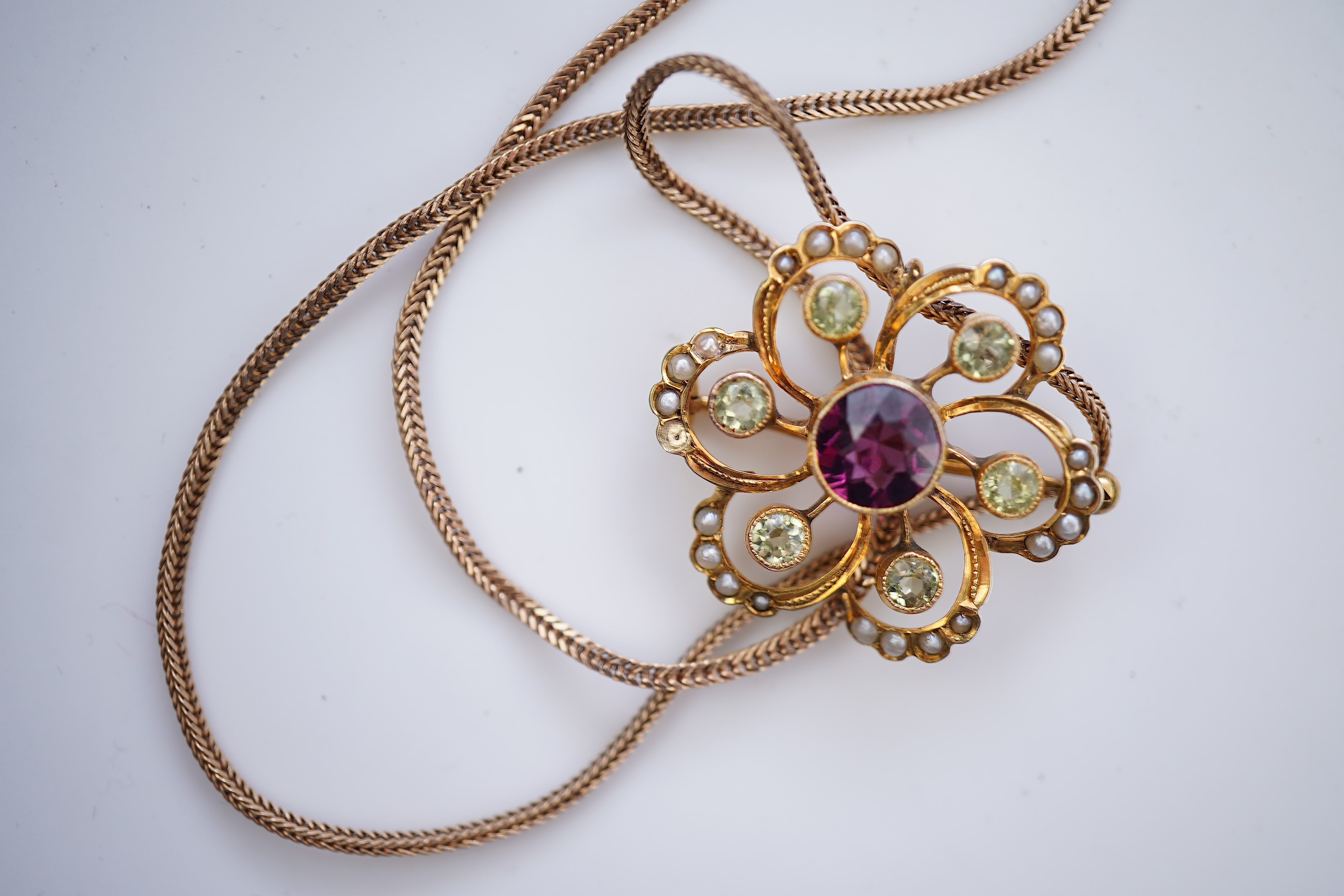 Three Edwardian gem-set pendants, early 20th century